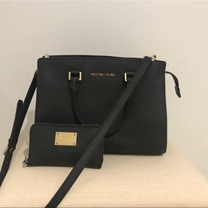 Black Michael Kors purse and wallet to match
